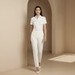 Relaxed fit linen shirt for women by FJØRNA, short sleeve top made from breathable linen fabric, casual summer style.