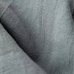 FJØRNA women's cotton linen trousers with drawstring, relaxed fit, and casual style, shown on a model.