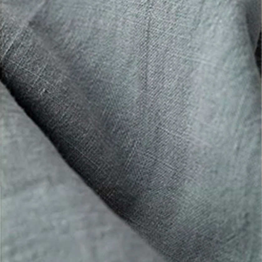 FJØRNA women's cotton linen trousers with drawstring, relaxed fit, and casual style, shown on a model.