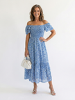 FJØRNA women's floral summer midi dress with puff sleeves and wrap design, perfect for warm weather and casual outings.