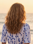 FJØRNA women's summer midi dress with floral print, short sleeves, wrap design, casual style, perfect for warm weather.