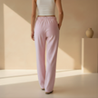 FJØRNA women's lounge trousers with elastic waist and pockets, soft and comfortable pants for relaxed wear.