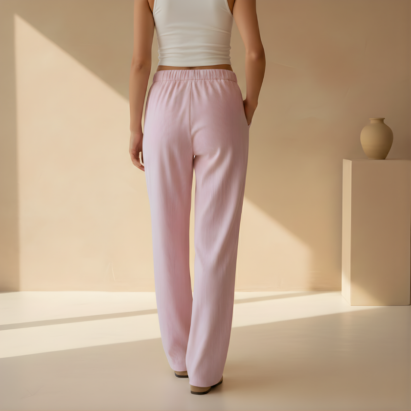 FJØRNA women's lounge trousers with elastic waist and pockets, soft and comfortable pants for relaxed wear.