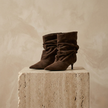 FJØRNA women's suede ankle boots with a sleek design, pointed toes, and block heels, perfect for stylish fall and winter outfits.