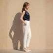 FJØRNA women's top, stylish and comfortable, featuring a fitted design and soft fabric, ideal for casual wear.