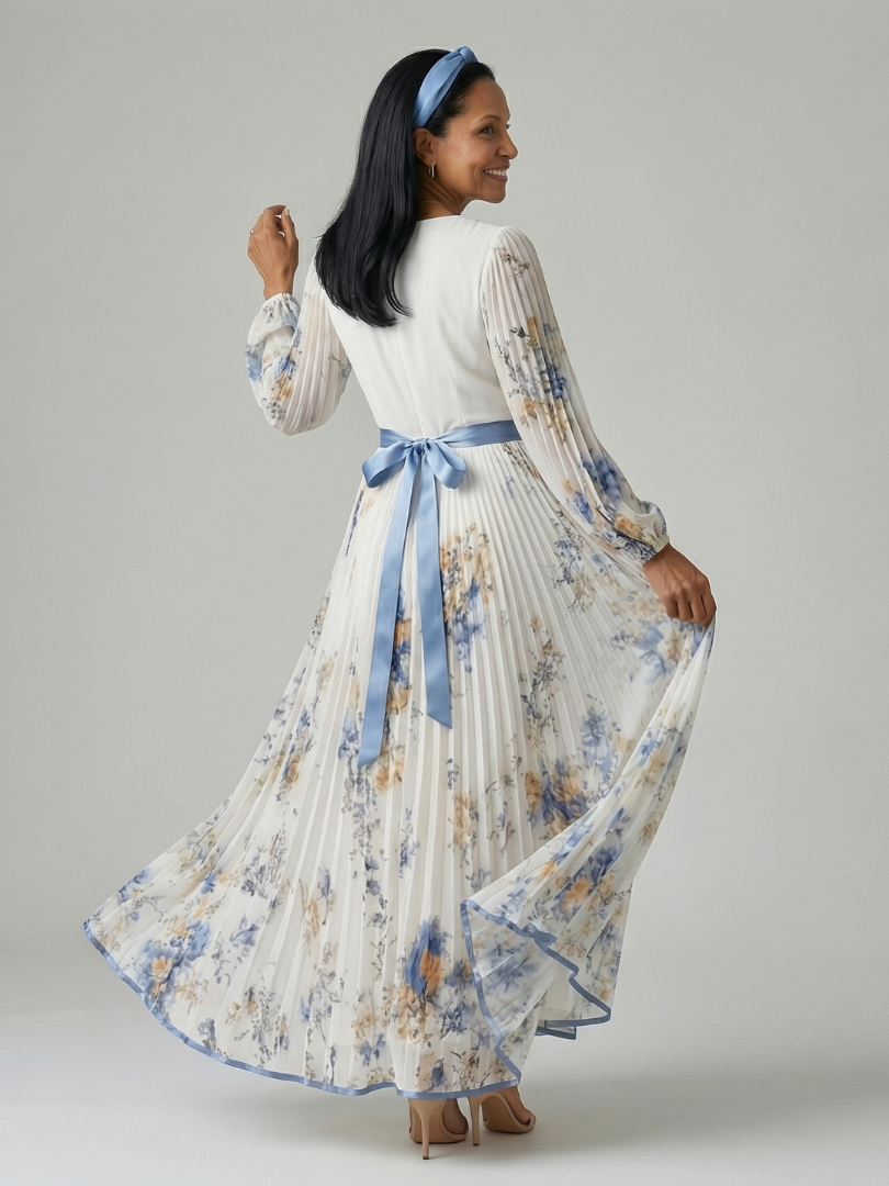 FJØRNA women's summer midi dress with floral pattern, V-neck, and long sleeves, perfect for warm weather.