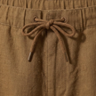 FJØRNA men's cotton linen trousers with drawstring, relaxed fit, casual pants featuring a lightweight, breathable fabric and neutral tone.