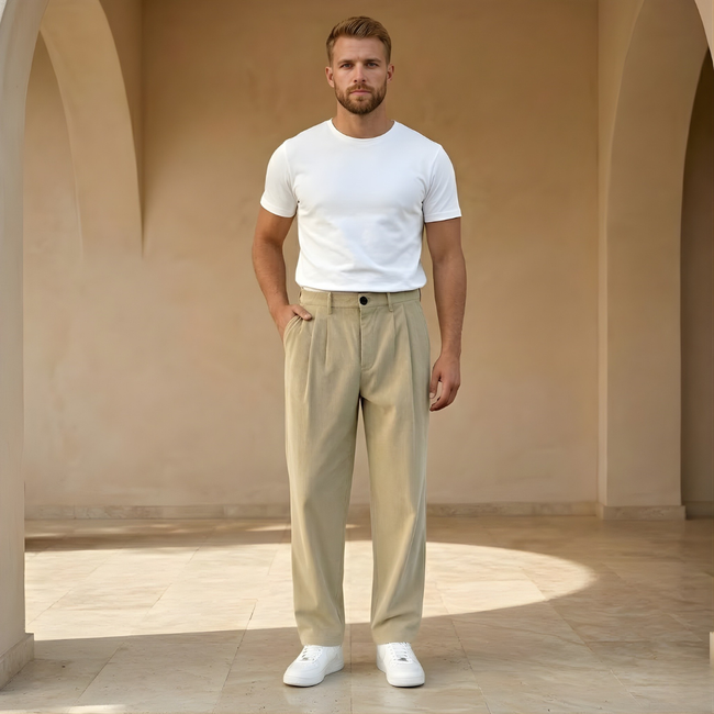 Men’s FJØRNA straight leg corduroy trousers in casual style, showing the beige fabric and classic fit on a hanger.