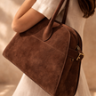 Large vegan suede handbag for women by FJØRNA, stylish and spacious with a sleek design and top handle.