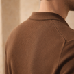 Red wool men's jacket by FJØRNA, stylish outerwear with a tailored fit and classic design, shown on a model.