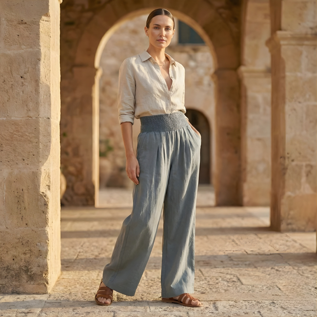 FJØRNA women's wide leg high waist elastic trousers, stylish and comfortable pants with a relaxed fit and modern design.