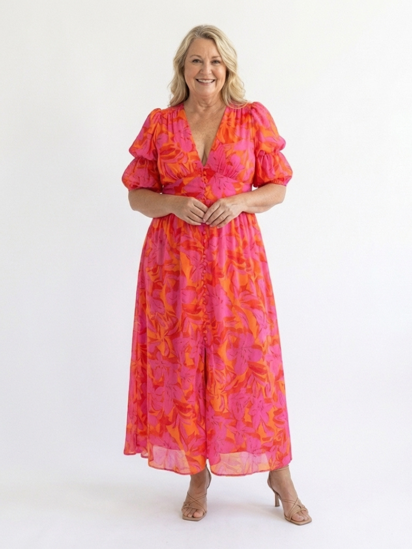 FJØRNA women's summer midi dress with floral pattern and puff sleeves, lightweight and perfect for warm weather.