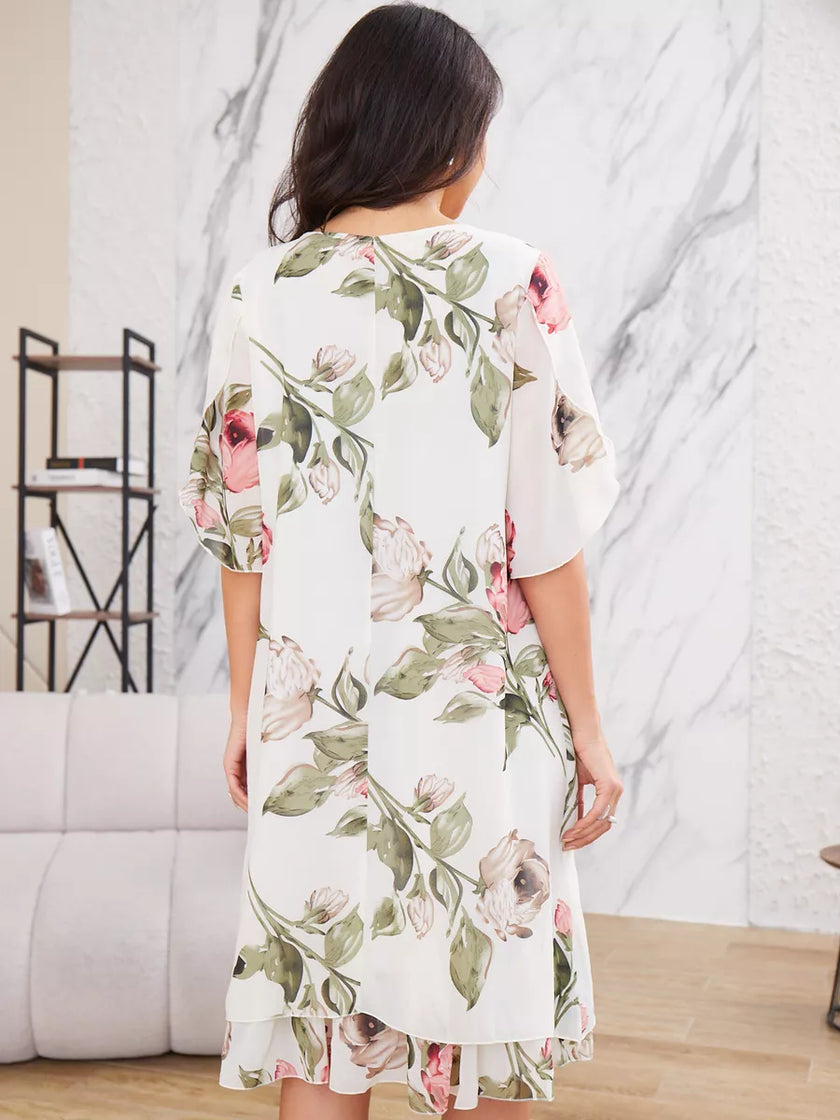 FJØRNA Violeta Elegant dress in white chiffon with flowy fabric, stylish design, perfect for formal occasions or summer events.