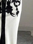 FJØRNA white midi dress with half sleeves, floral print, tied waist, and V-neck, perfect for casual summer wear