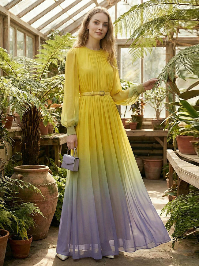 FJØRNA high waisted long sleeve maxi dress with belt, contrast color gradient, pleated design, split joint, and round neckline.