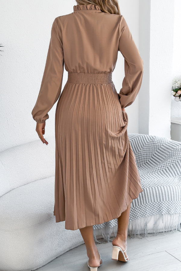 FJØRNA solid color long-sleeved fitted waist pleated midi dress featuring elegant design and flowing fabric.