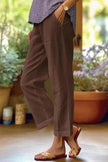 FJØRNA lightweight summer women's trousers with straight legs, breathable fabric, and front pockets, ideal for warm weather.