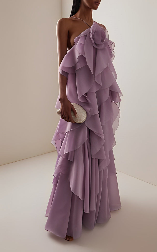 FJØRNA halter neck layered ruffle maxi dress for wedding guests, featuring a flowing design and elegant ruffle details.