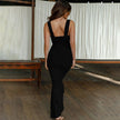 FJØRNA ruched mermaid evening dress in elegant fabric, fitted silhouette with ruffled detailing, perfect for formal occasions.