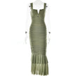 FJØRNA ruched mermaid evening dress in elegant fabric, fitted silhouette with flared hem and intricate design details.