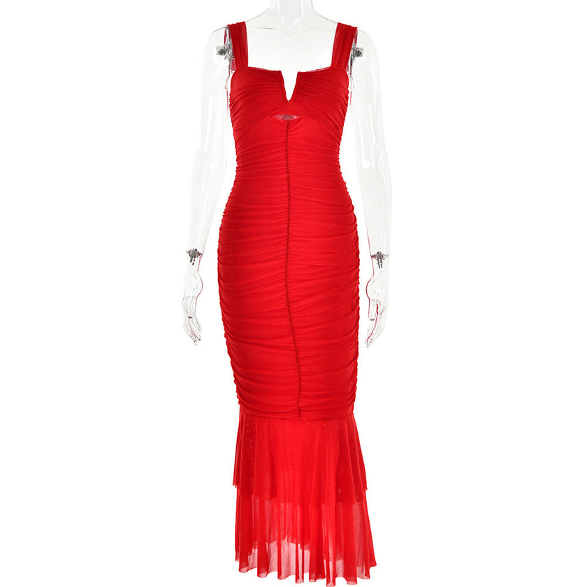 FJØRNA ruched mermaid evening dress with fitted bodice and flared skirt, elegant formal wear for special occasions.