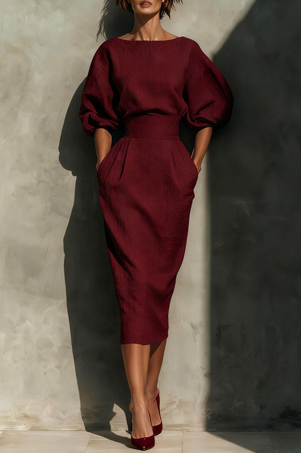 White FJØRNA puff sleeve high-waisted midi dress with pockets, casual style, featuring elegant design and relaxed fit.
