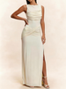 FJØRNA white sleeveless maxi dress with ruched bodice and side slit, flowing floor-length design for elegant summer wear.
