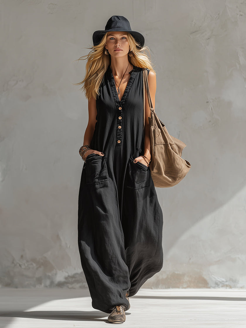 Black cotton linen sleeveless jumpsuit for women by FJØRNA, featuring a relaxed fit and stylish design.