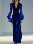 Royal blue velvet V-neck mesh long sleeve jumpsuit by FJØRNA, featuring a fitted silhouette and elegant design.