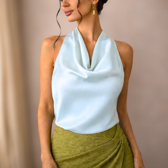 FJØRNA satin top for women, stylish and smooth, featuring a sleek design ideal for casual or dressy occasions.