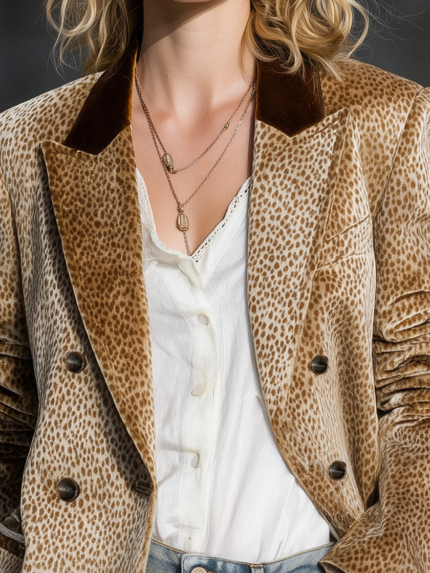 FJØRNA khaki leopard print colour-block velvet blazer with tailored fit, featuring bold animal print and contrasting fabric panels.