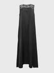 FJØRNA white sleeveless maxi dress with hollow design, split-joint, round-neck, and solid color for elegant summer style.
