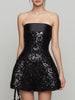 FJØRNA strapless satin-trim sequin mini dress with A-line silhouette, featuring shimmering sequins and a sleek, elegant design.