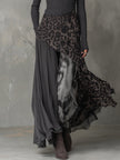 FJØRNA leopard print maxi dress featuring a casual, flowing design with long sleeves and a fitted waist.