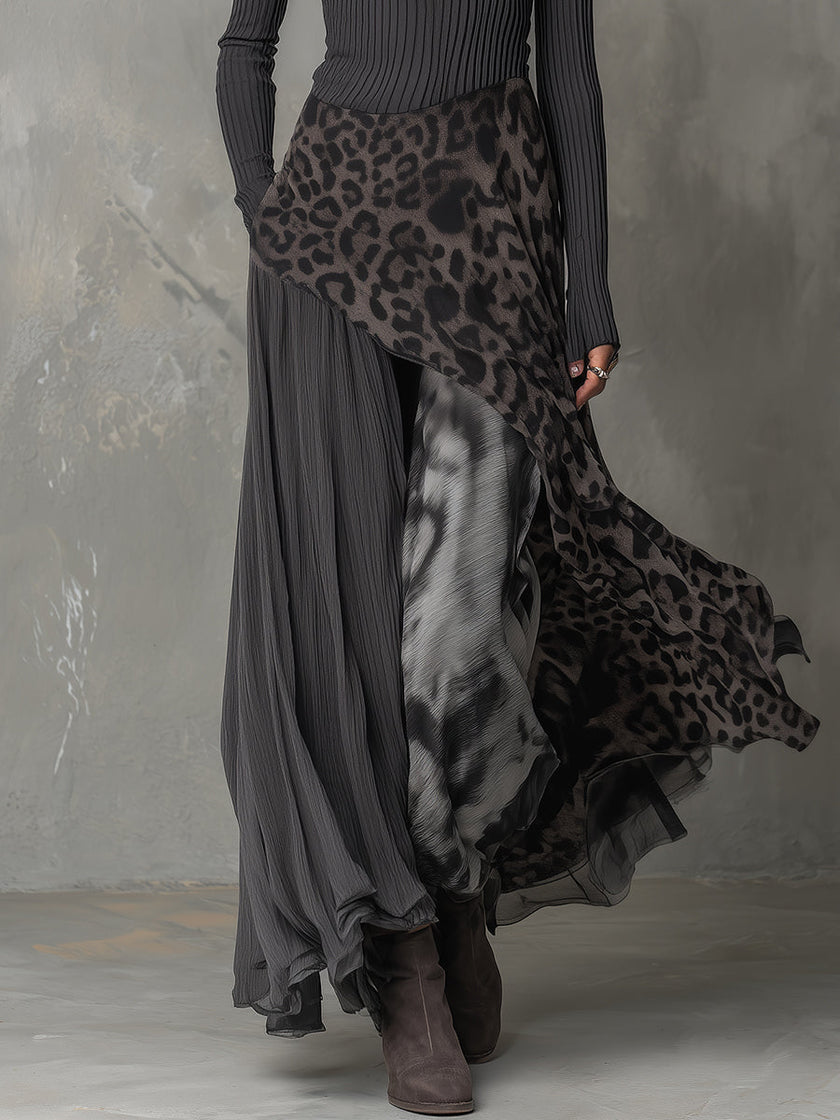 FJØRNA leopard print maxi dress featuring a casual, flowing design with long sleeves and a fitted waist.