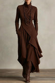 FJØRNA solid color high-neck long-sleeved irregular casual maxi dress displayed on a hanger, showcasing its elegant design.