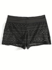 Women's boho beach shorts with elastic waistband by FJØRNA, featuring lightweight fabric and relaxed fit for summer wear.
