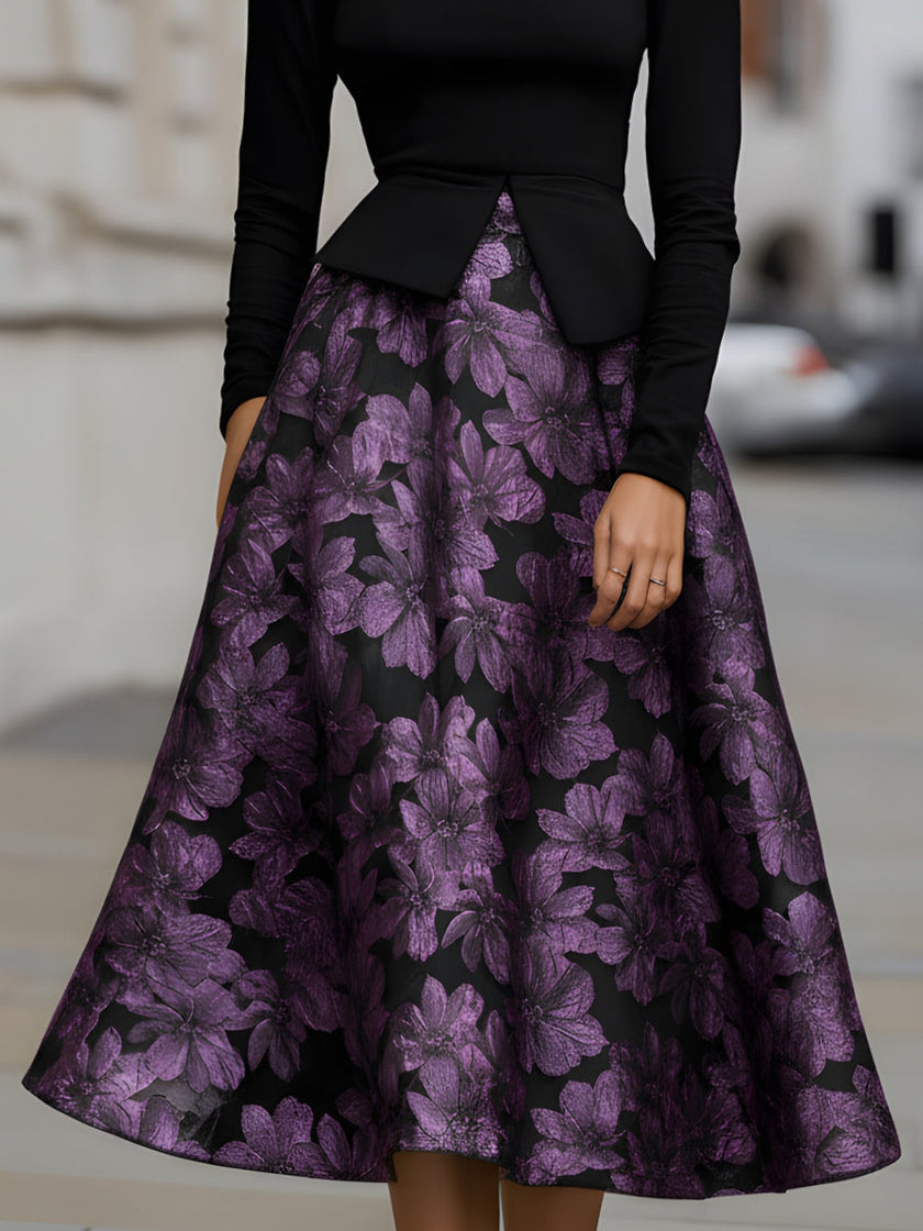 FJØRNA floral jacquard peplum bodice midi dress with a fitted waist and elegant floral pattern, perfect for stylish occasions.