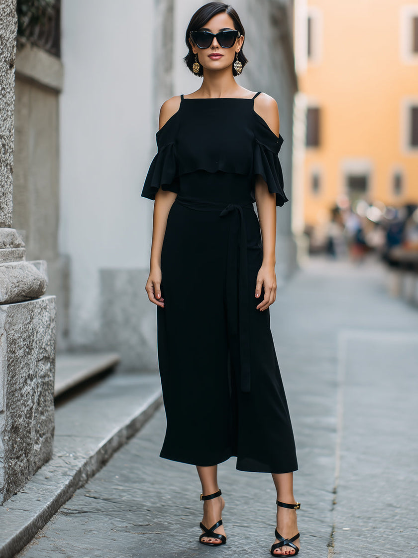 FJØRNA elegant cold-shoulder midi dress with ruffle details, stylish and feminine for women, featuring a flowy silhouette.