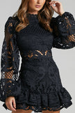 FJØRNA Hannah white lace dress, elegant sleeveless dress with intricate lace details and a flowing skirt, perfect for special occasions.