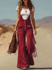 Brown micro suede tassel wide-leg dungarees from FJØRNA, featuring overalls with tassel details and a relaxed wide-leg fit.