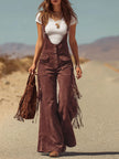 FJØRNA brown micro suede tassel wide-leg dungarees overalls hanging on a display with tassel details and wide-leg style.