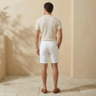 FJØRNA men's linen blend shorts with a tailored, relaxed fit, featuring a comfortable waistband and casual summer style.