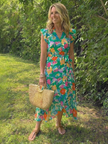 FJØRNA women's floral tiered summer midi dress with a flowy silhouette and vibrant floral pattern, perfect for warm weather.