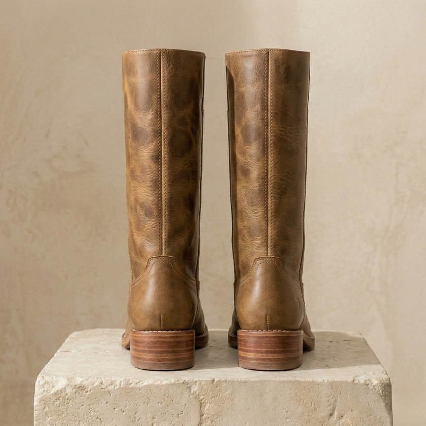 Tan leather knee-high men's boots with block heels from FJØRNA, featuring a stylish and sturdy design.