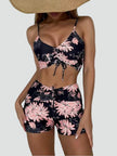 FJØRNA women's printed tankini set showing a stylish, flattering fit with colorful pattern and supportive tankini top and bottoms.