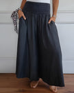 FJØRNA women's lightweight summer trousers with relaxed fit, elastic waist, and breathable fabric, ideal for casual wear.