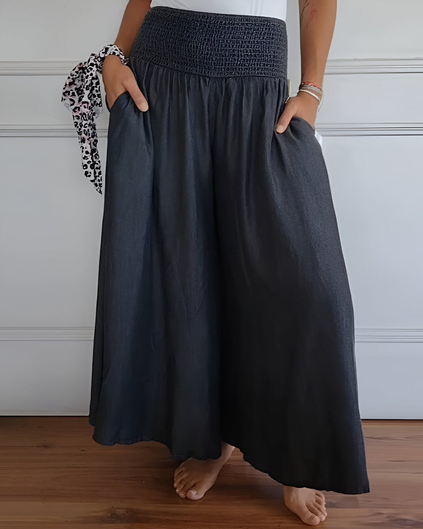 FJØRNA women's lightweight summer trousers with relaxed fit, elastic waist, and breathable fabric, ideal for casual wear.