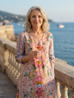 FJØRNA women's floral summer midi dress with long sleeves, wrap design, flowy fabric, perfect for warm weather.