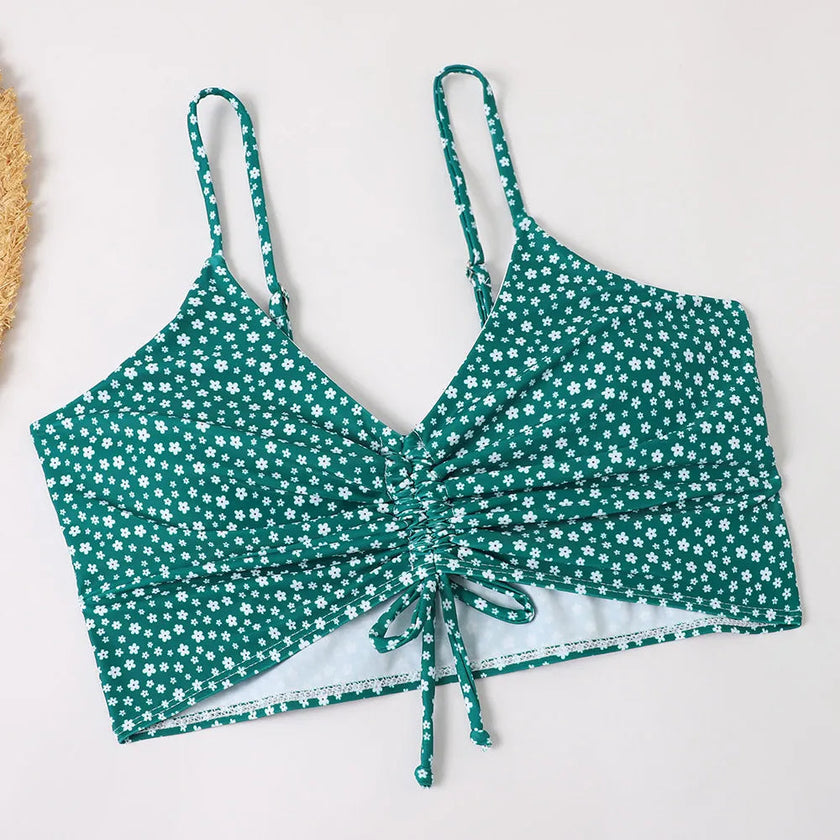 Women's FJØRNA printed tankini set with flattering fit, featuring colorful patterns and supportive design for beach or pool wear.